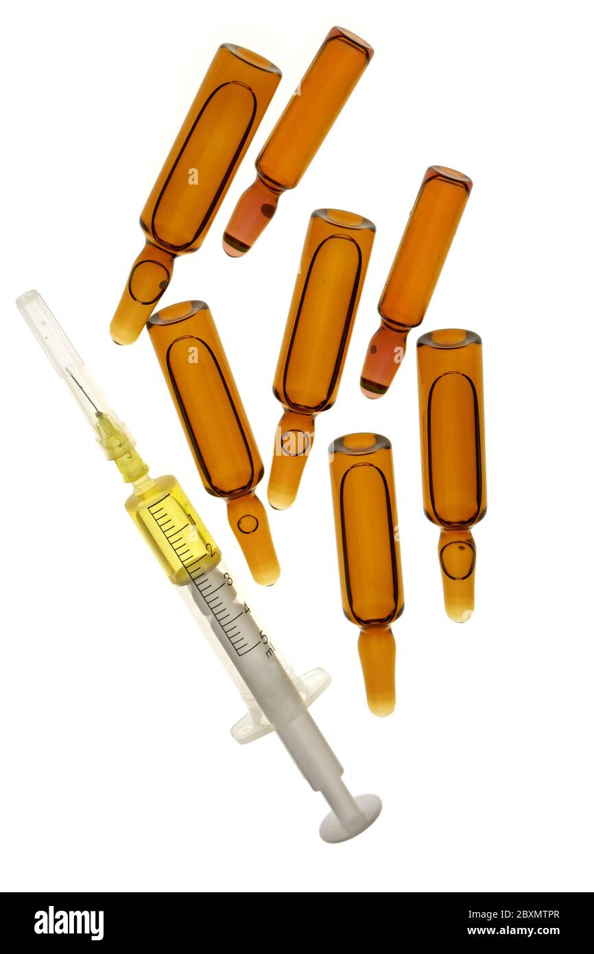 Medical ampoules and syringe Isolated on a white background.Medicine and health concept. Beauty industry concept.Vaccination for viral diseases. glass Stock Photo
