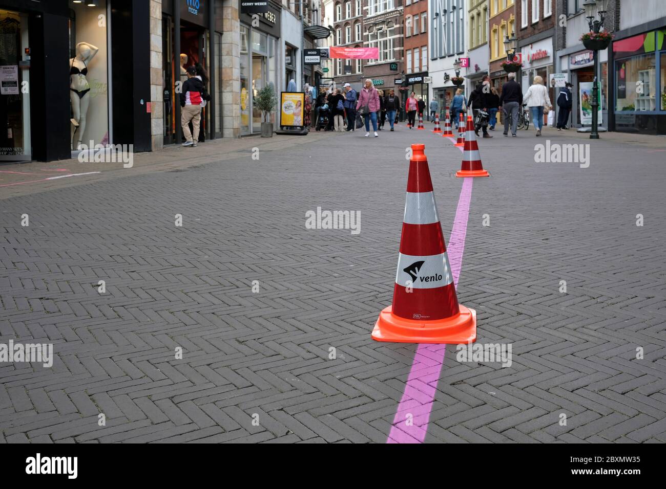 Venlo, Netherlands - 7 June 2020: The pedestrian zone is being divided to enable social distancing in the shopping streets of the city of Venlo. Stock Photo