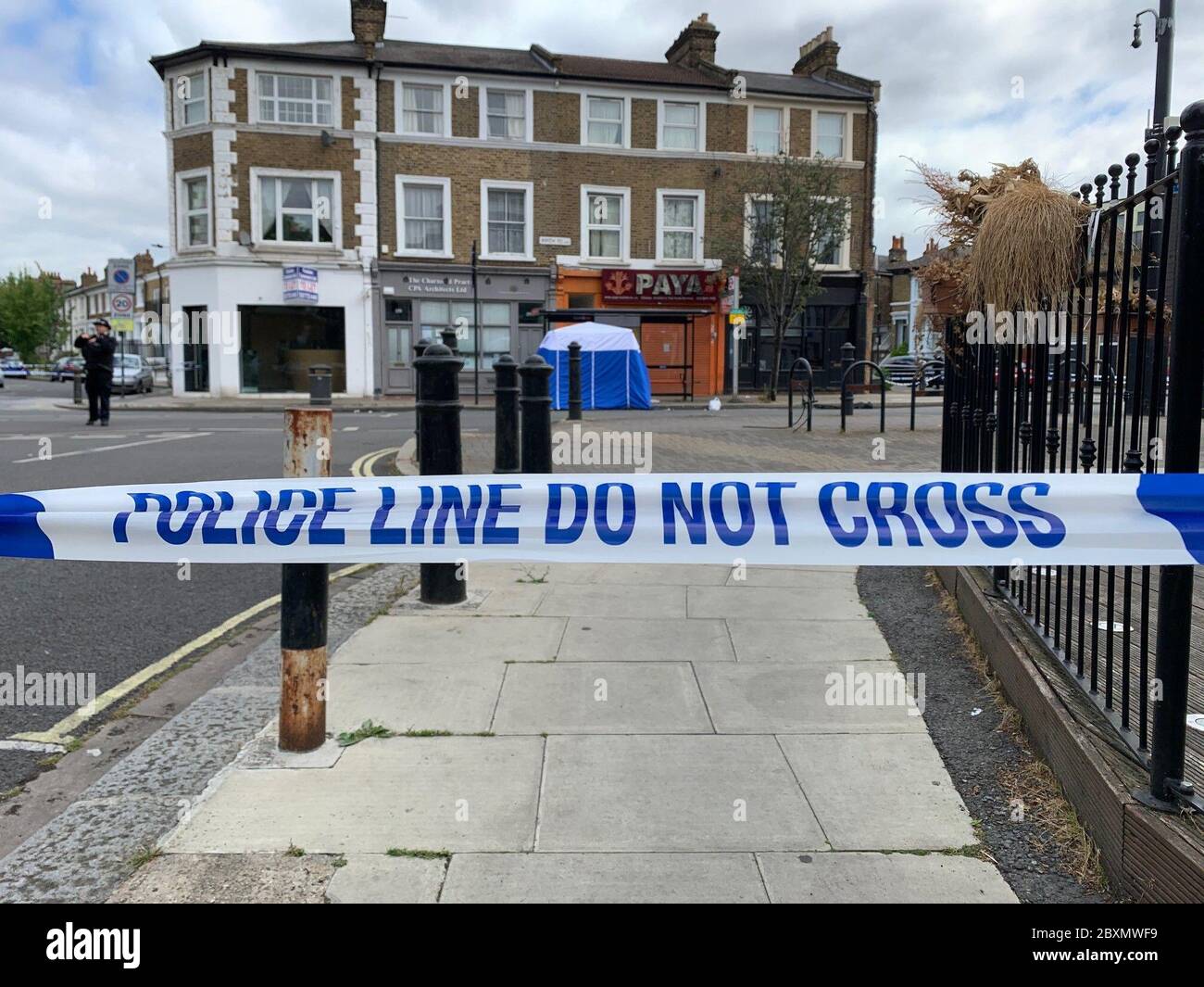 the-scene-at-askew-road-at-the-junction-with-ashchurch-terrace-as-a