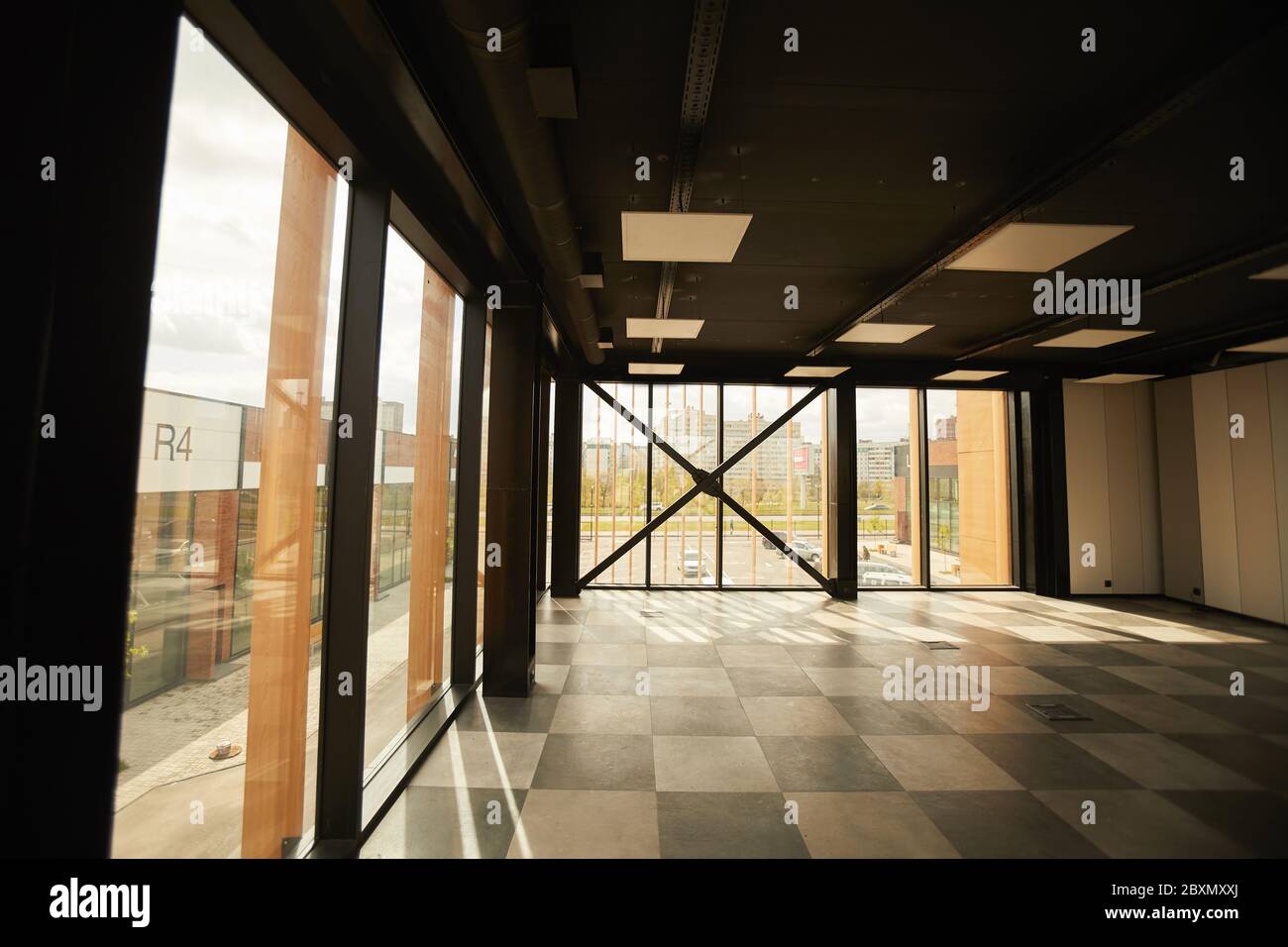 Background image of empty office building interior with contemporary graphic design, copy space Stock Photo