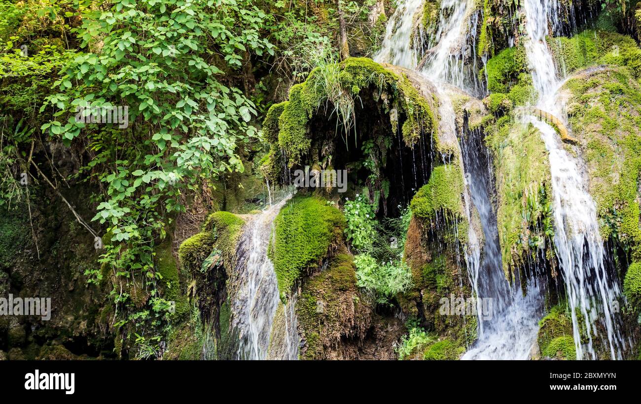 Mossy Rocks Fall waterfall with mossy rock structure Stock Photo - Alamy