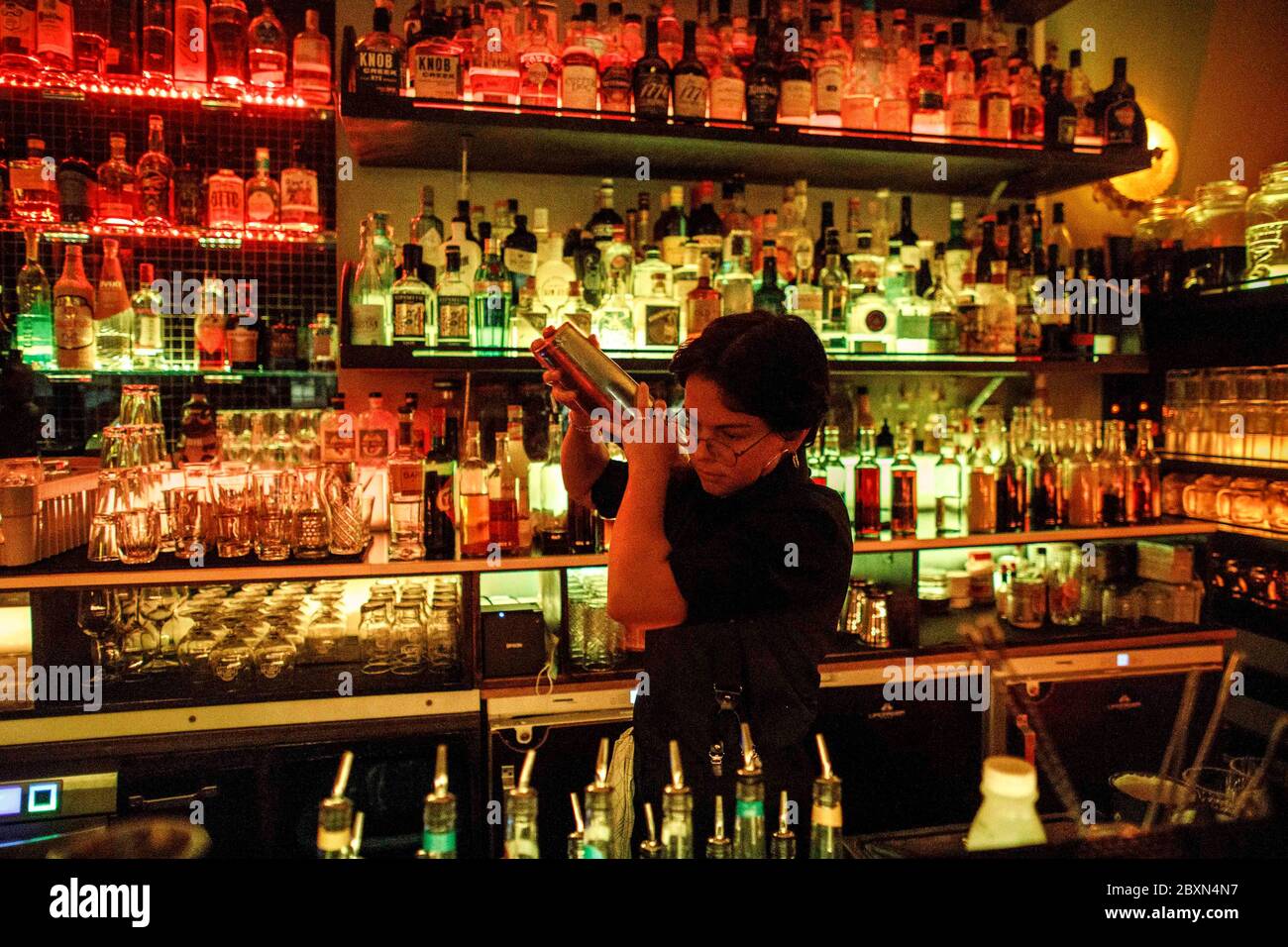 Berlin, Germany. 05th June, 2020. The bartender mixes cocktails at the