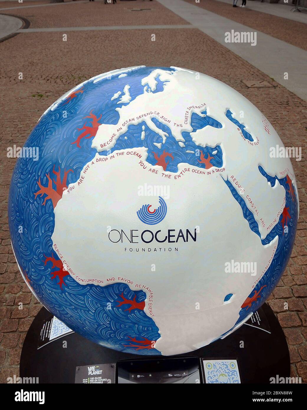 Milan, Italy. 08th June, 2020. Milan, As part of World Oceans Day,  Inauguration of the Globo One Ocean Foundation, in Piazza della Scala,  within the WePlanet project 100 Globi per environment, The artist who  created the Globe Fred Salsa, Beatrice Mosca ...