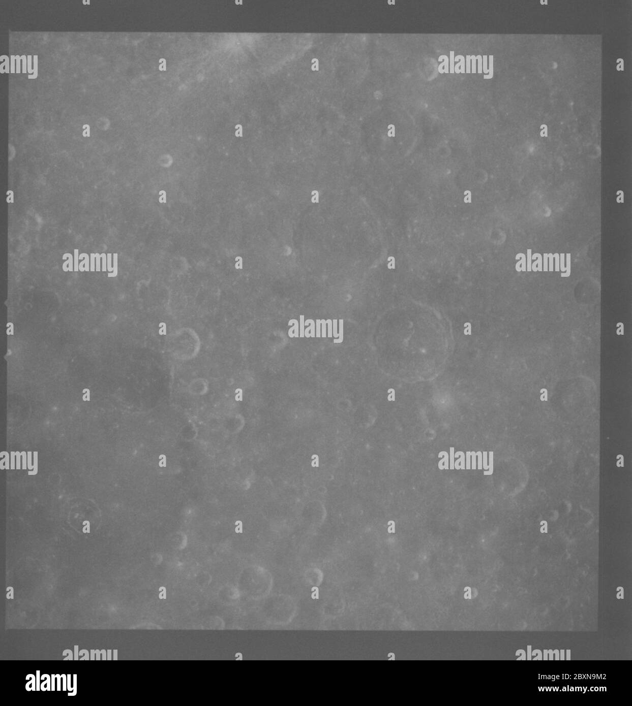 AS08-18-2847 - Apollo 8 - Apollo 8 Mission image, Moon; Scope and content:  The original database describes this as: Description: Apollo 8,Moon. Latitude 11 degrees South,Longitude 78 degrees East. Camara Tilt Mode: Near Vertical (NV). Direction: South. Sun Angle 47. Original Film Magazine was labeled G. Camera Data: 70mm Hasselblad. Shutter Speed: 1/250; Film Type: Kodak SO-2458 Black and White,ASA 2000. December 21-27,1968. Subject Terms: Apollo 8 Flight, Lunar Photography, Craters Categories: Lunar Observations Original: Film - 70MM B&W Interior Exterior: Exterior  Ground Orbit: On-orbit; 1 Stock Photo