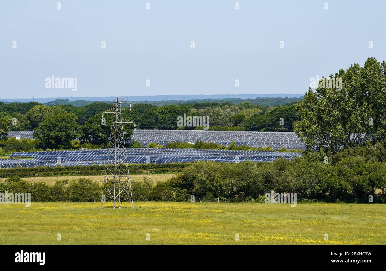 Solar Panel farm next door to Arlington Reservoir near Eastbourne East Sussex UK Sussex UK  Photograph taken by Simon Dack Stock Photo