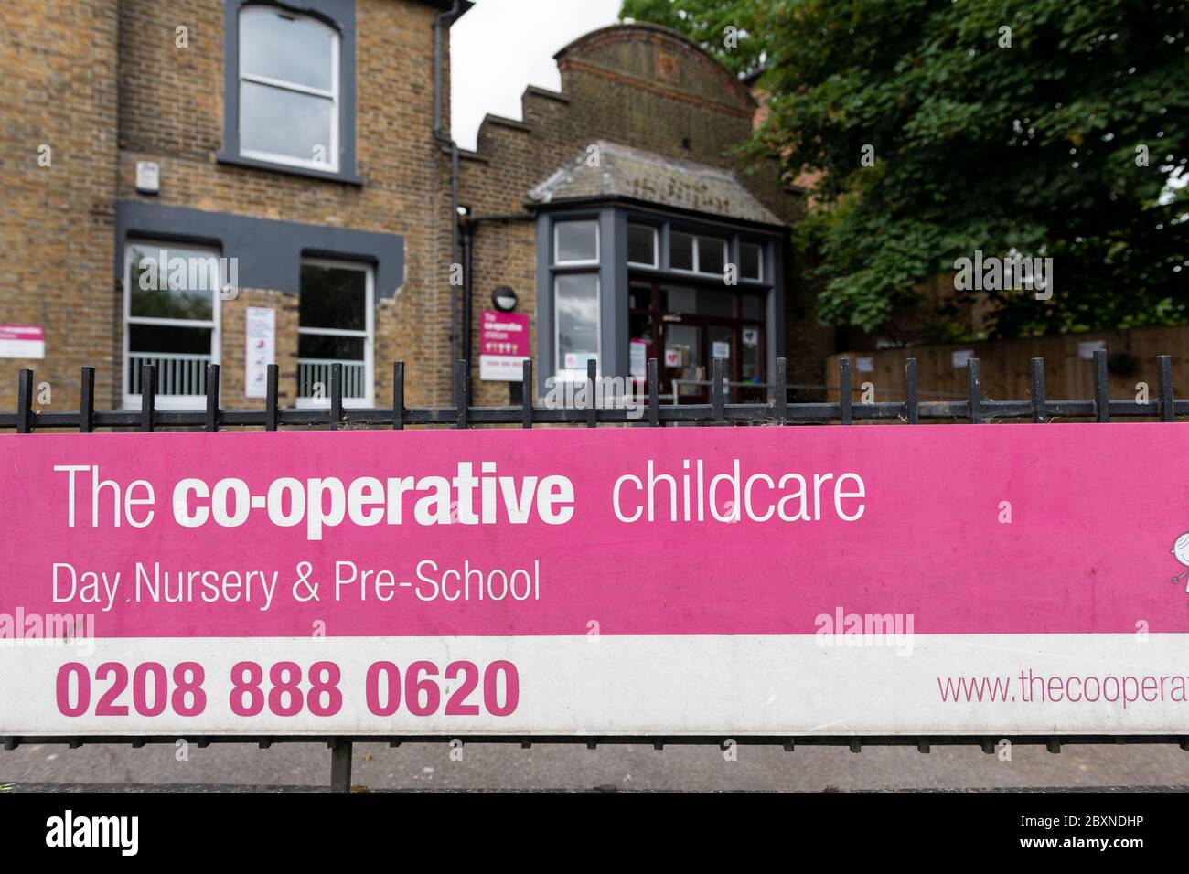 The sign for a childcare day nursery run by the Co-operative. Stock Photo