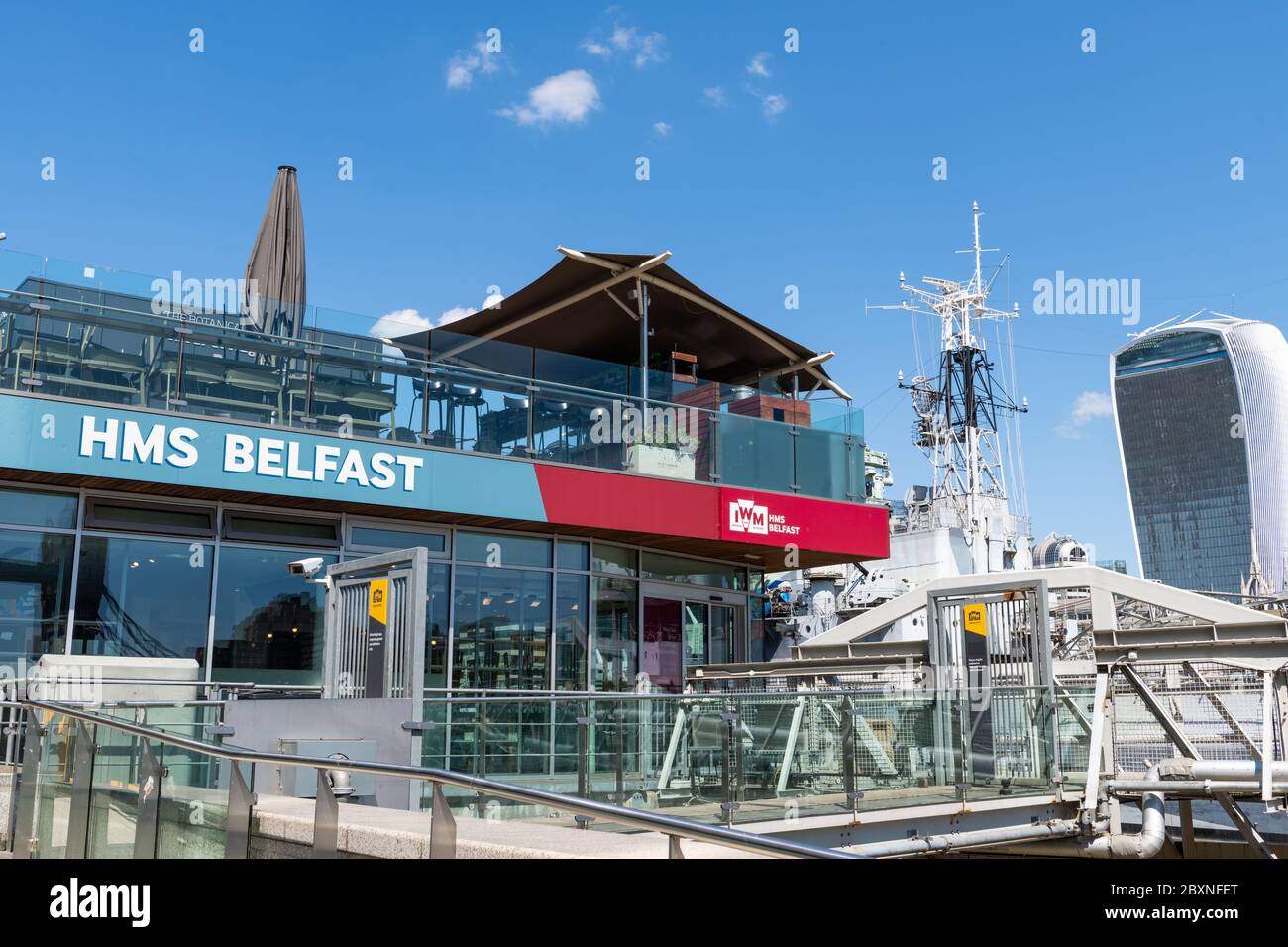 The ticket office and entrance to the museum battleship HMS Belfast. A popular tourist attraction in London, UK. Stock Photo