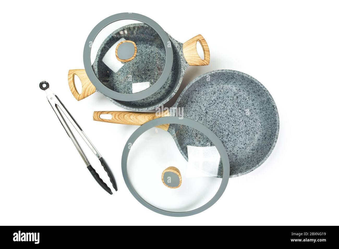 Photo of a ceramic frying pan with a lid and pans with a lid isolated