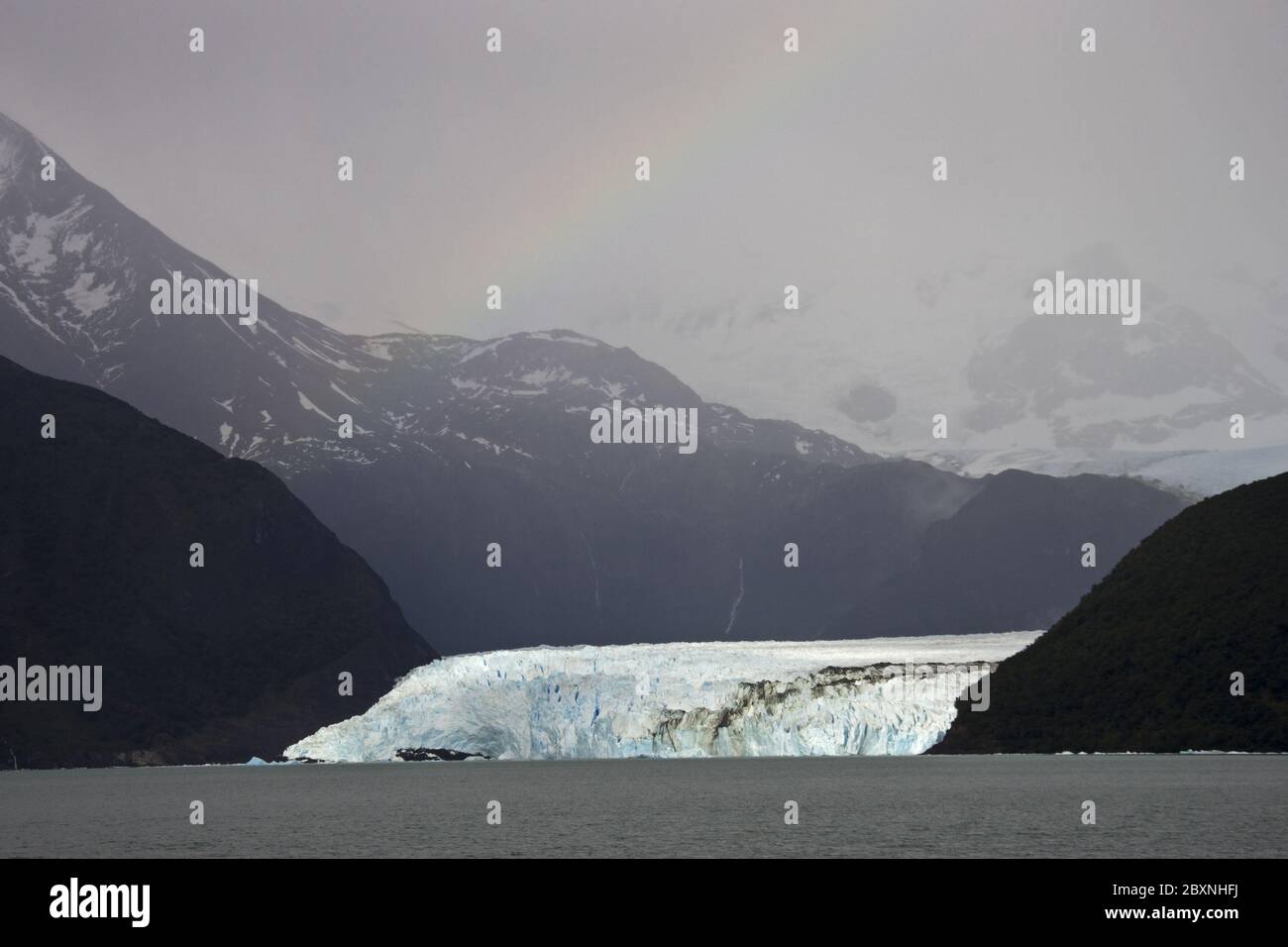 rainbow over Spegazzini Glacier at Lago Argentino, Parque Nacional Los Glaciares, Argentina Stock Photo