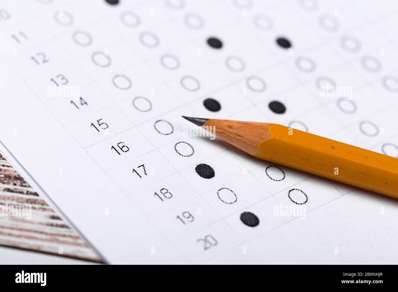 pencil for the exam. printed school test Answer sheet Stock Photo