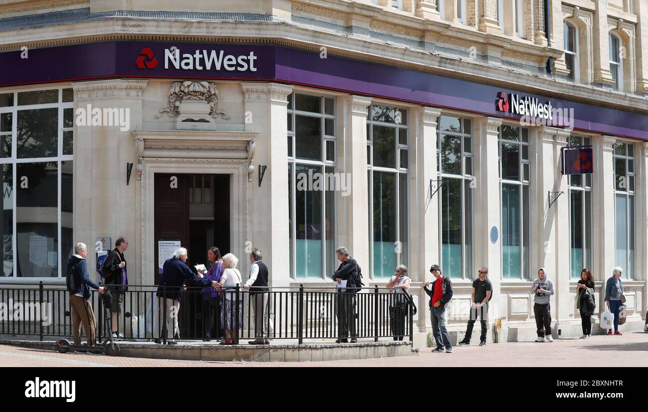 Bournemouth, UK. 8th June 2020.  Customers queueing for the Nat West Bank in Bournemouth Square as social distancing policies limit the number of people that can be in the building. Credit: Richard Crease/Alamy Live News Stock Photo