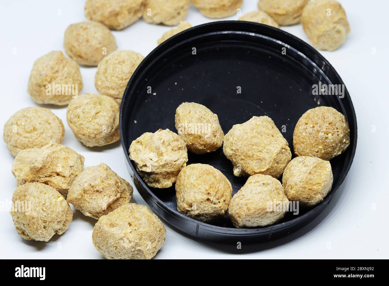 Protein Chunks Soya protein chunks used in vegetarian and vegan food, isolated on a ...