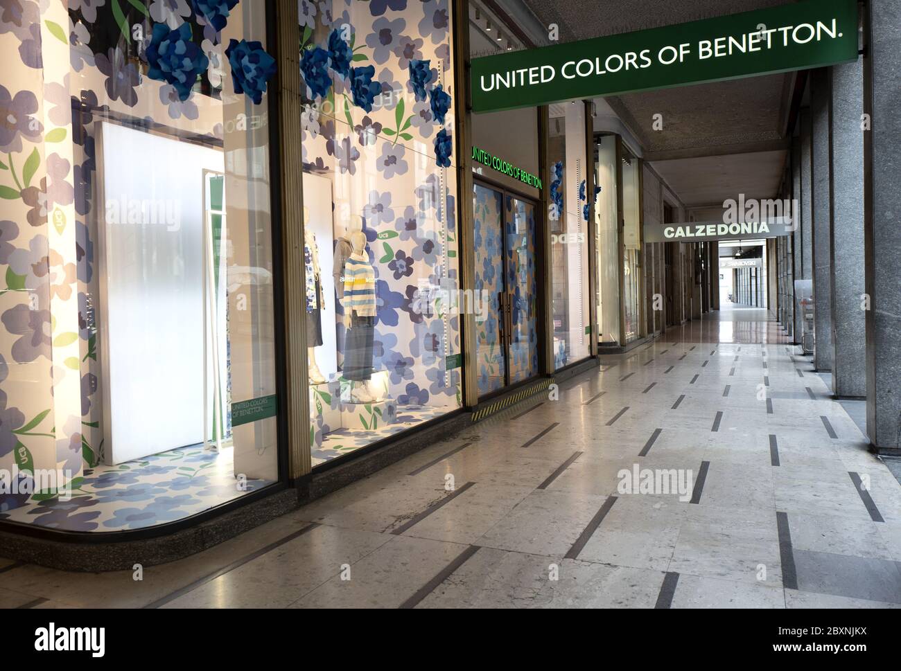 Fashion shops closed in Vittorio Emanuele street, during the lockdown due to the Coronavirus, in Milan, Italy. Stock Photo