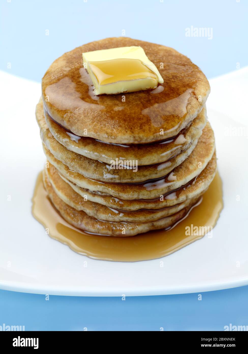 Tasty traditional russian breakfast of slapjack with honey on plate. Rustic  style. Space for your text and top view Stock Photo - Alamy