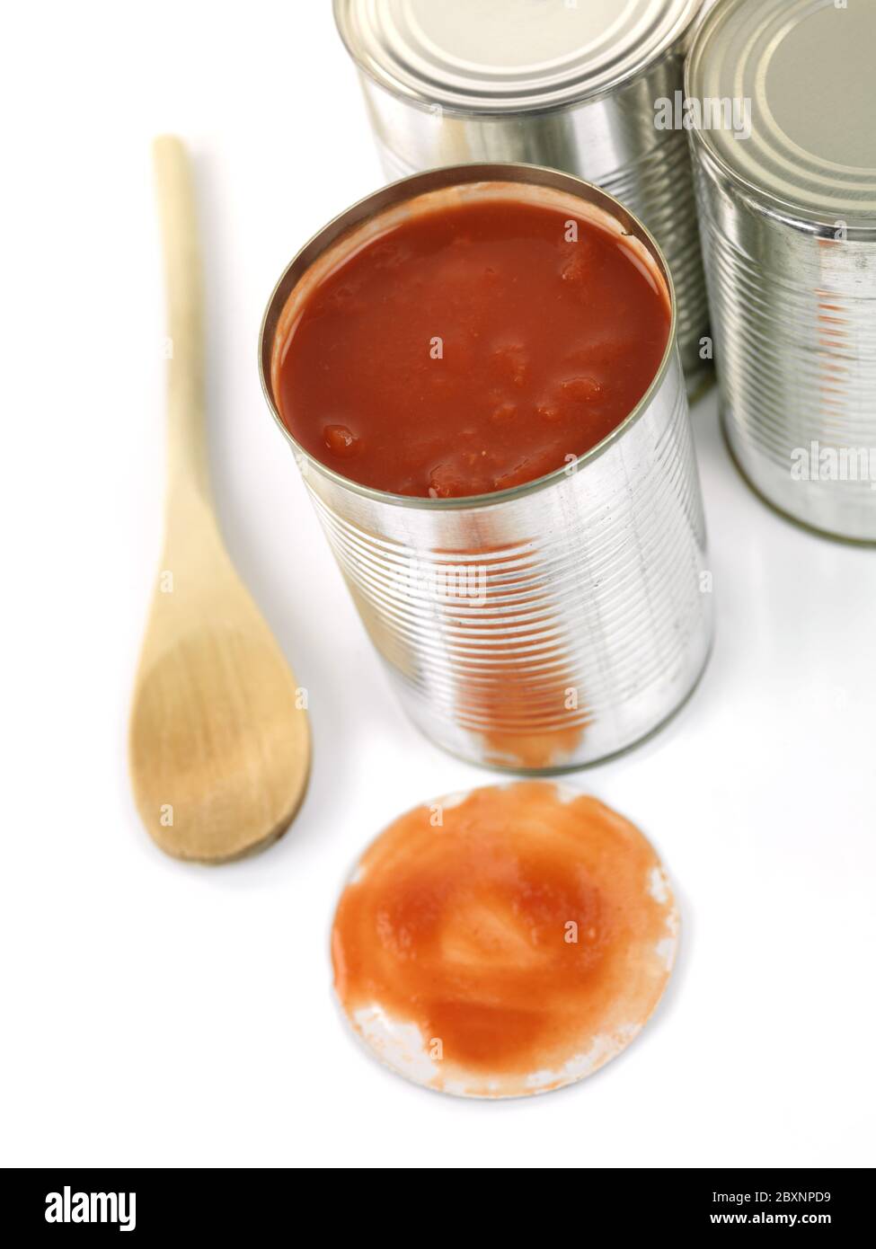 Cans of diced tomatoes isolated against a white background Stock Photo