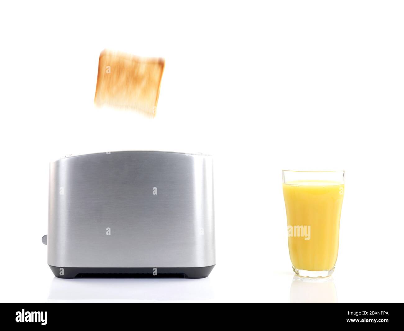 Plain white toast popping up from a toaster isolated against a white