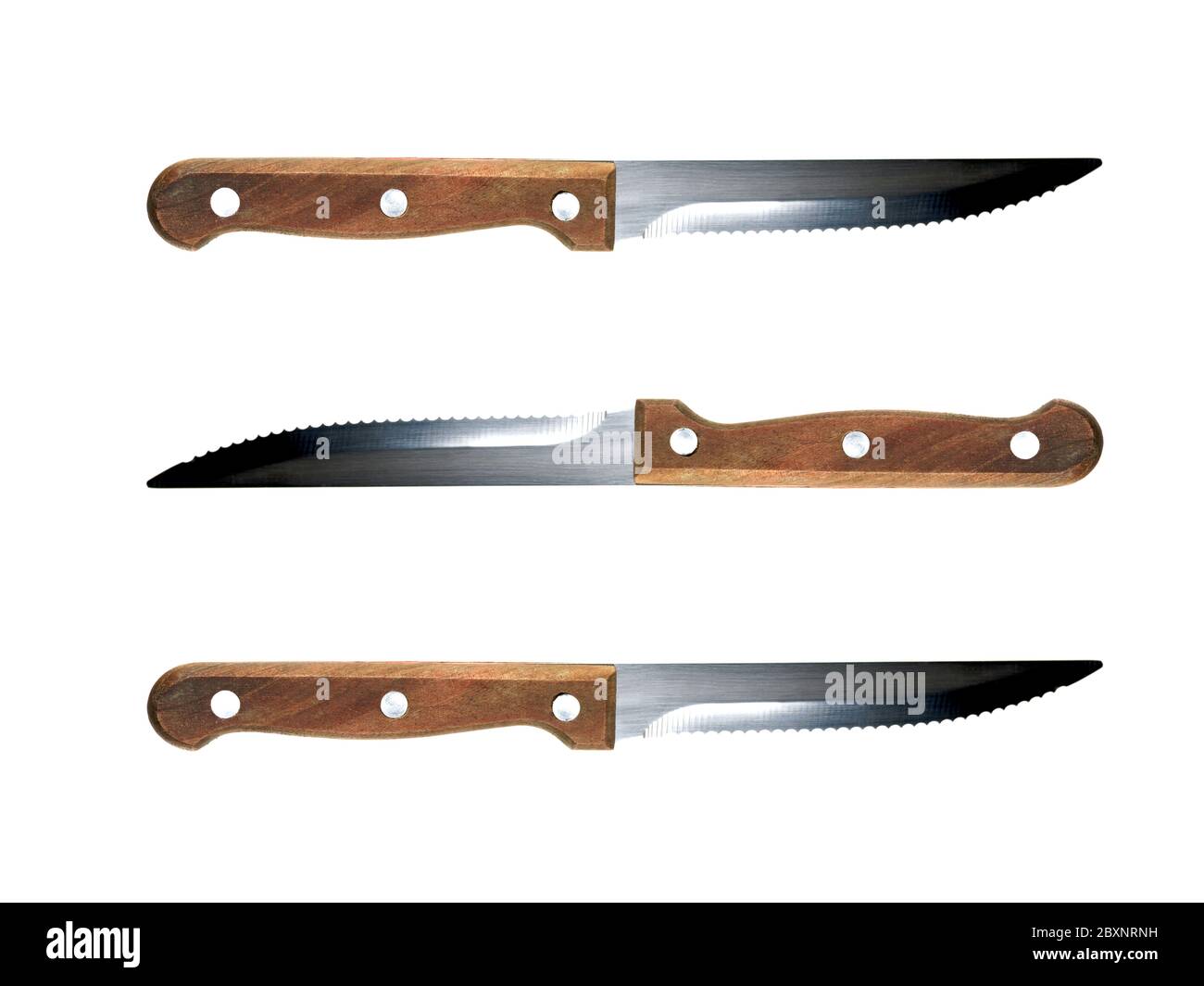 Steak knives isolated against a white background Stock Photo