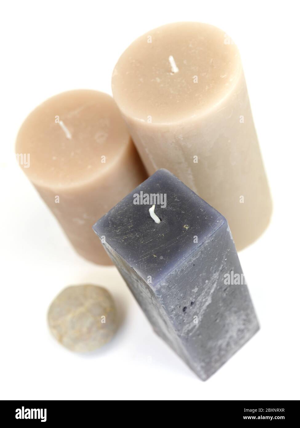 Scented candles isolated against a white background Stock Photo - Alamy