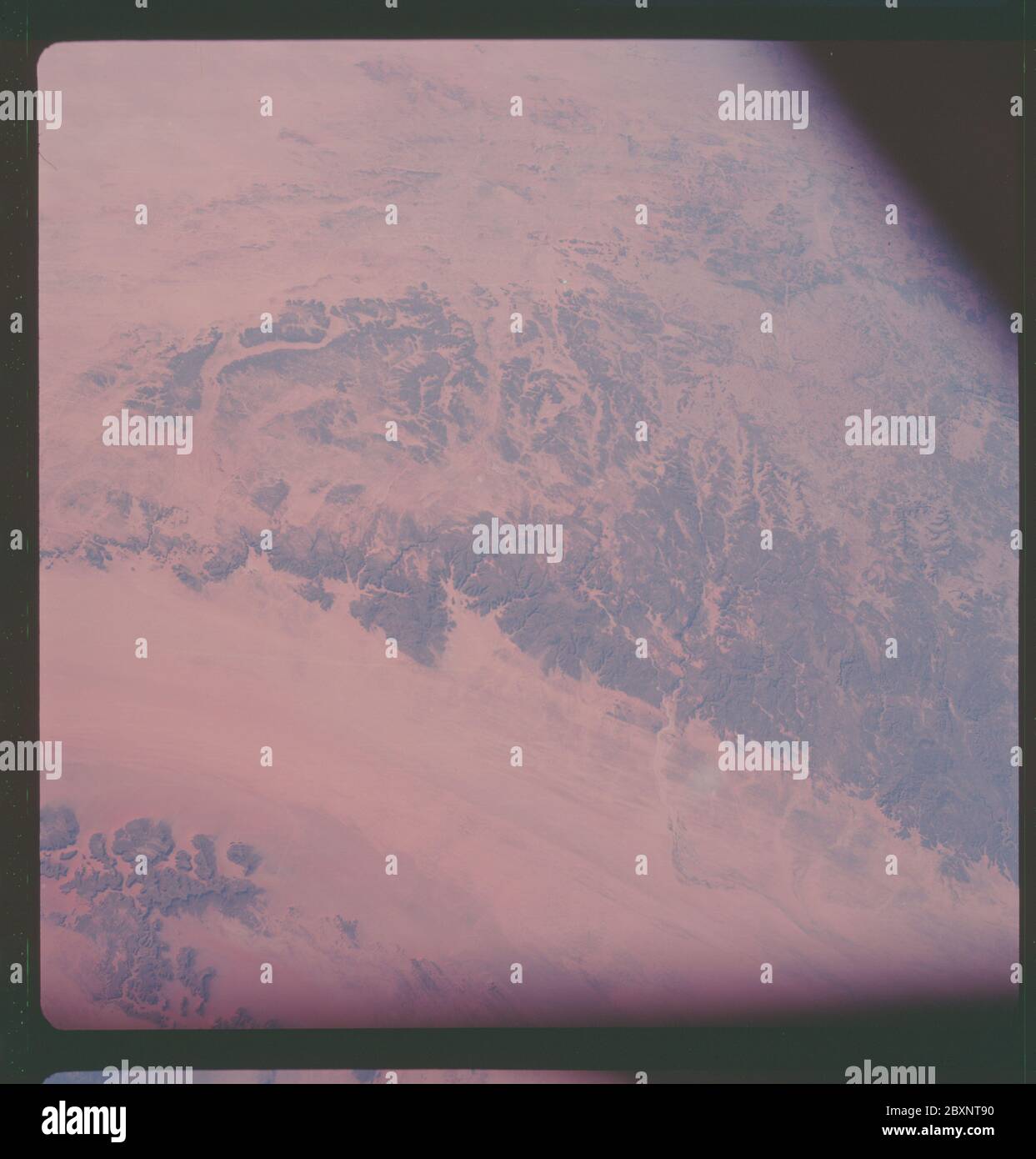 AS07-11-1998 - Apollo 7 - Apollo 7 Mission, Africa; Scope and content:  The original database describes this as: Description: Apollo 7,Chad,Sudan,Libya Enmedi Plateau,Mourdi Depression. Low oblique. Cloud Cover 0%%. Altitude: 132 miles. Latitude: 17' degrees 30' North,Longitude: 23' degrees 00' East. Original film magazine was labeled P. Camera Data: Hasselblad 500-C; Lens: Zeiss Planar,F/2.8,80mm; Film Type: Kodak SO-121,Aerial Ektachrome; Filter: None. Flight Date: October 11-12. 1968. Subject Terms: Apollo 7 Flight, Earth Observations (From Space), Africa, Chad, Libya, Sudan Categories: Ear Stock Photo