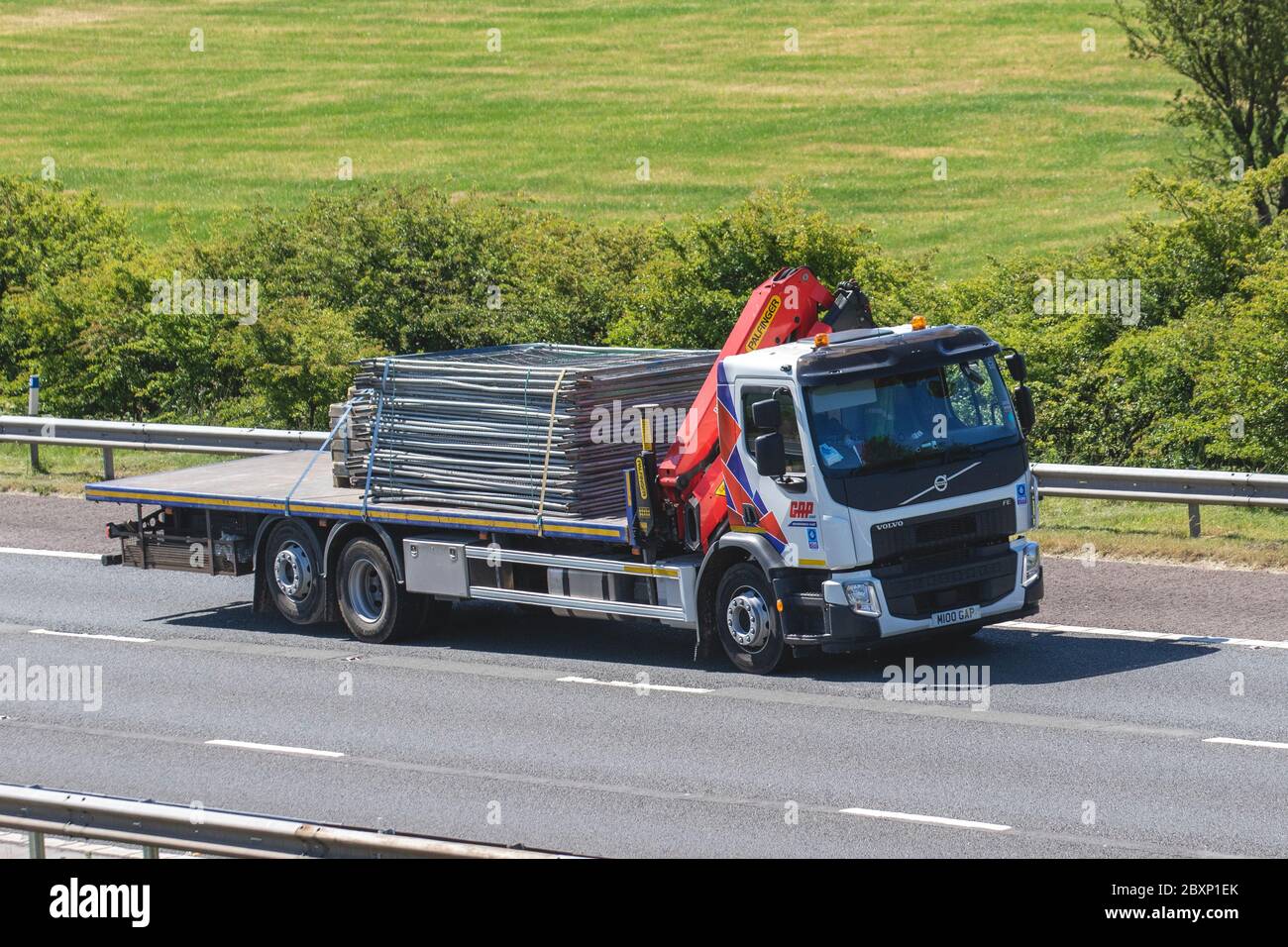 Gap Group Ltd; Haulage delivery trucks, lorry, transportation, truck, cargo carrier, private number plate, personalised, cherished, dateless registrations, DVLA registration marks, Volvo FEvehicle, European commercial transport industry HGV, M61 at Manchester, UK Stock Photo