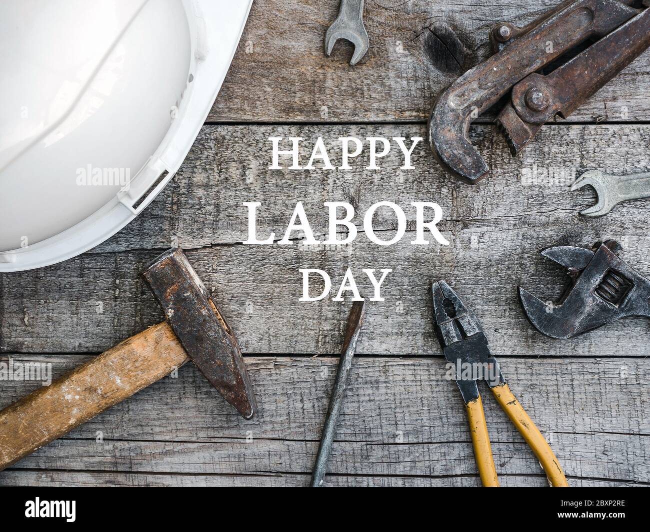 LABOR DAY. Hand tools lying on the table Stock Photo