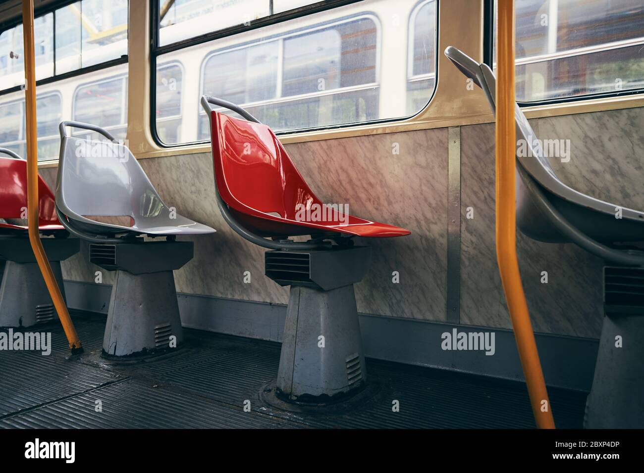 Empty seats in old tram of public transportation. Stock Photo