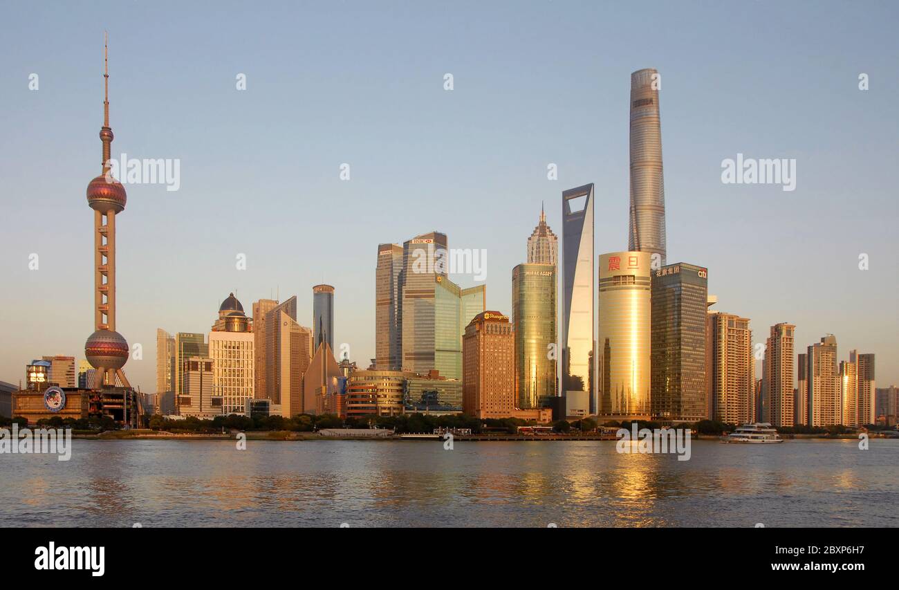 Shanghai skyline, China: The tall modern buildings in the business district of Lujiazui in Pudong, Shanghai with the Huangpu River in the foreground. Stock Photo