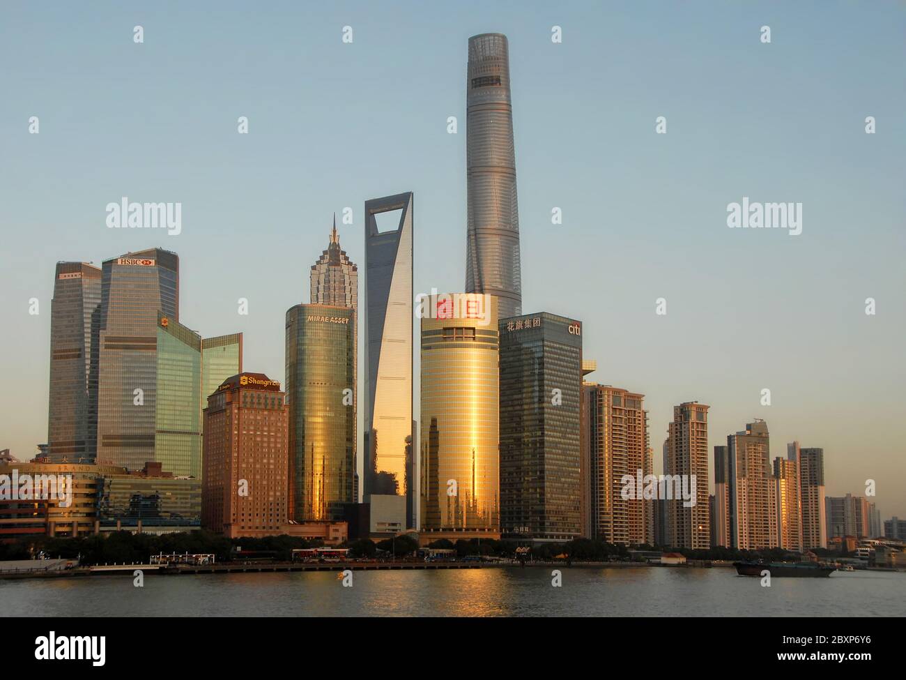Shanghai skyline, China: The tall modern buildings in the business district of Lujiazui in Pudong, Shanghai with the Huangpu River in the foreground. Stock Photo