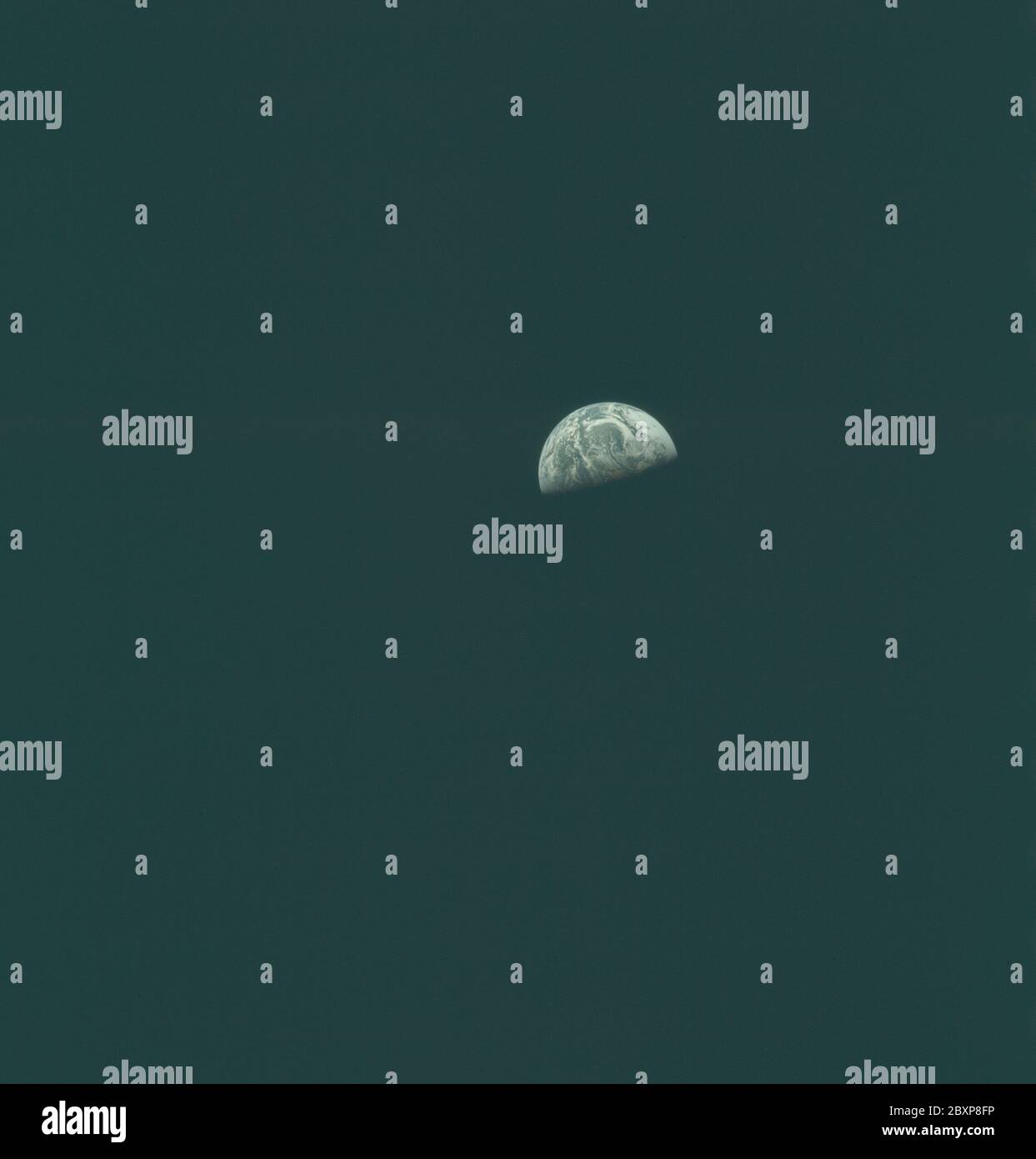 AS10-27-3898 - Apollo 10 - Apollo 10 Mission image - Earth rise; Scope and content:  The original database describes this as: Description: View of Earth, Lunar-Earth Sequence taken during Apollo 10 Mission.  Principal Point in Space.  Film magazine was N,film type was SO-368 with 250mm lens.  Film type was 70mm color. Subject Terms: Apollo 10 Flight, Earth Observation (From Space) Categories: Earth Observations Original: Film - 70MM CT Interior Exterior: Exterior  Ground Orbit: On-orbit; 1967 – 1972; Stock Photo