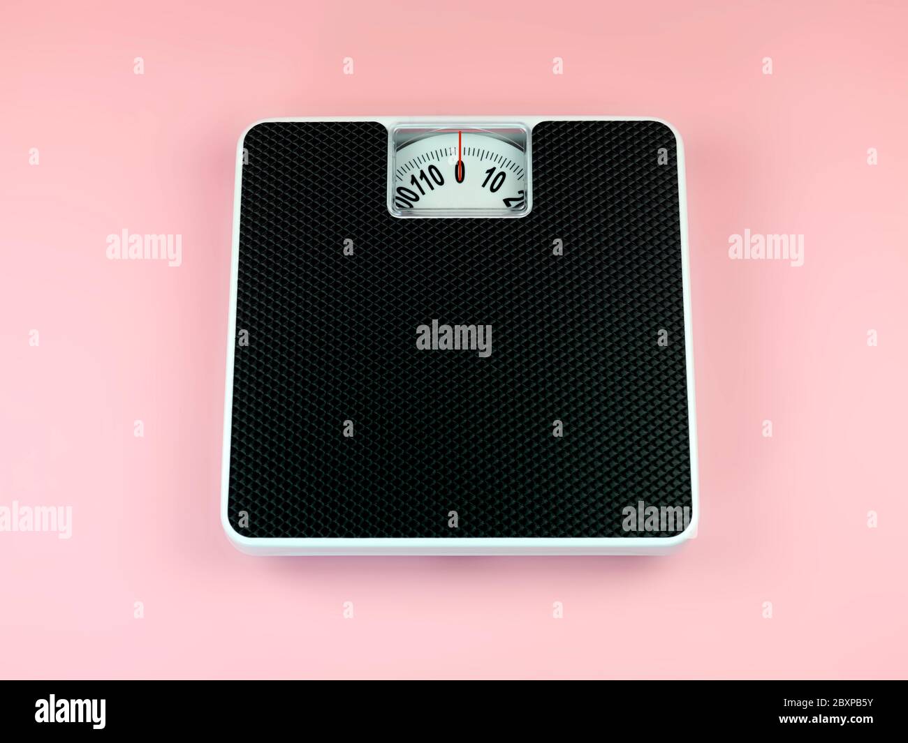 Vintage pink home weight scale isolated with clipping path Stock