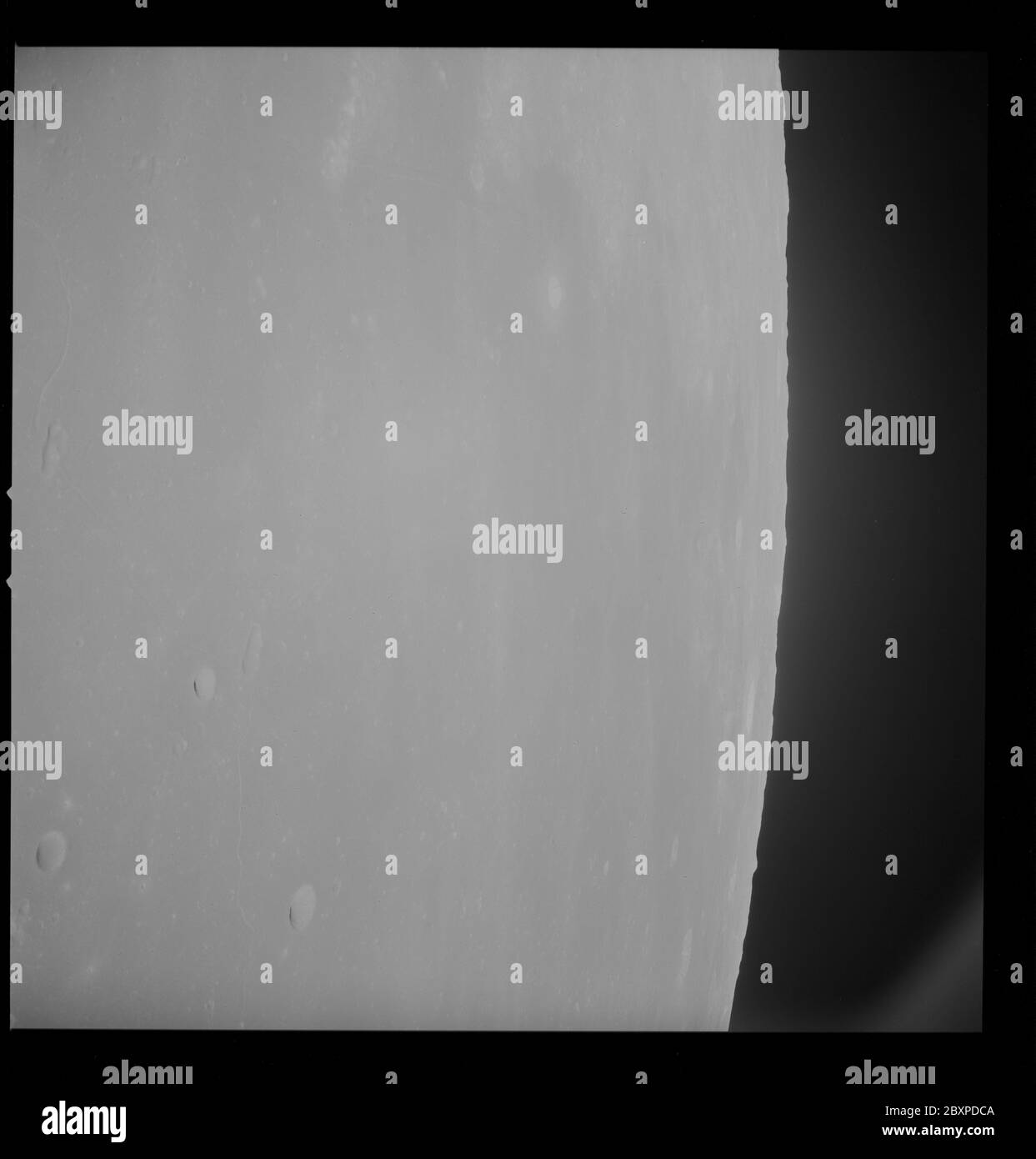 AS10-32-4751 - Apollo 10 - Apollo 10 Mission image - Site 2, Target of Opportunity 112 and 114; Scope and content:  The original database describes this as: Description: Oblique view of Site 2,Target of Opportunity 112 and 114 taken during Apollo 10 Mission.  Longitude was 25.0 east degrees east and Latitude was 0.6 degrees north.  Sun angle was medium.  Film magazine was S,film type was 3400 with 80mm lens.  Film type was 70mm black and white. Subject Terms: Apollo 10 Flight, Moon Categories: Lunar Observations Original: Film - 70MM B&W Interior Exterior: Exterior  Ground Orbit: On-orbit; 196 Stock Photo