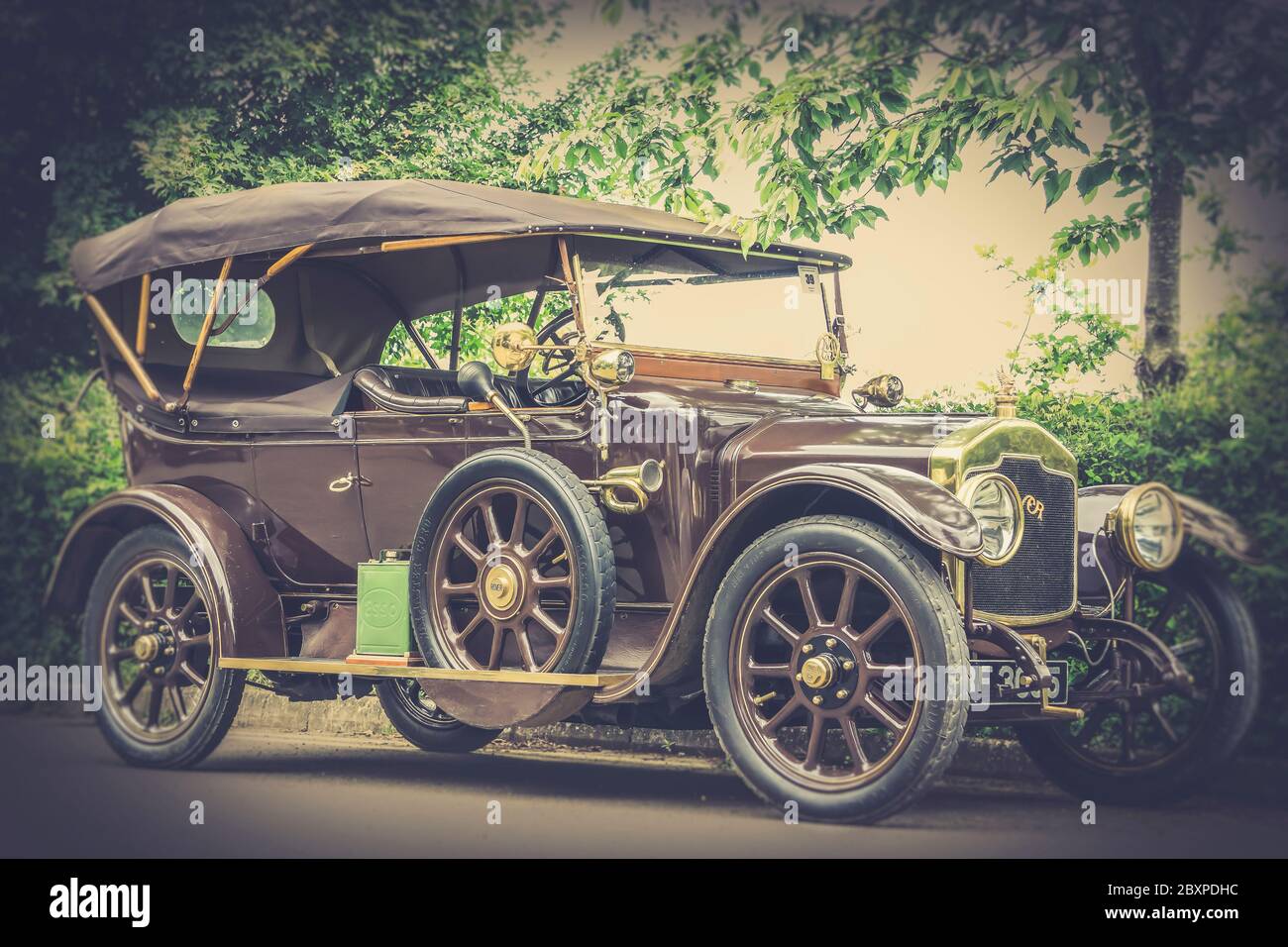 Side view of vintage UK Rover motor car isolated outdoors in summer sunshine. British classic cars. Stock Photo