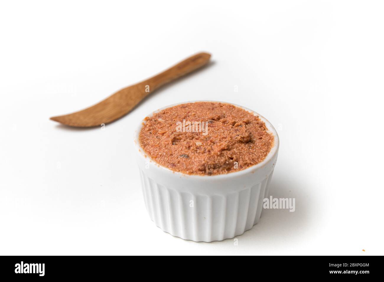 Sundried tomato paste. Dried Tomatoes paste isolated on white
