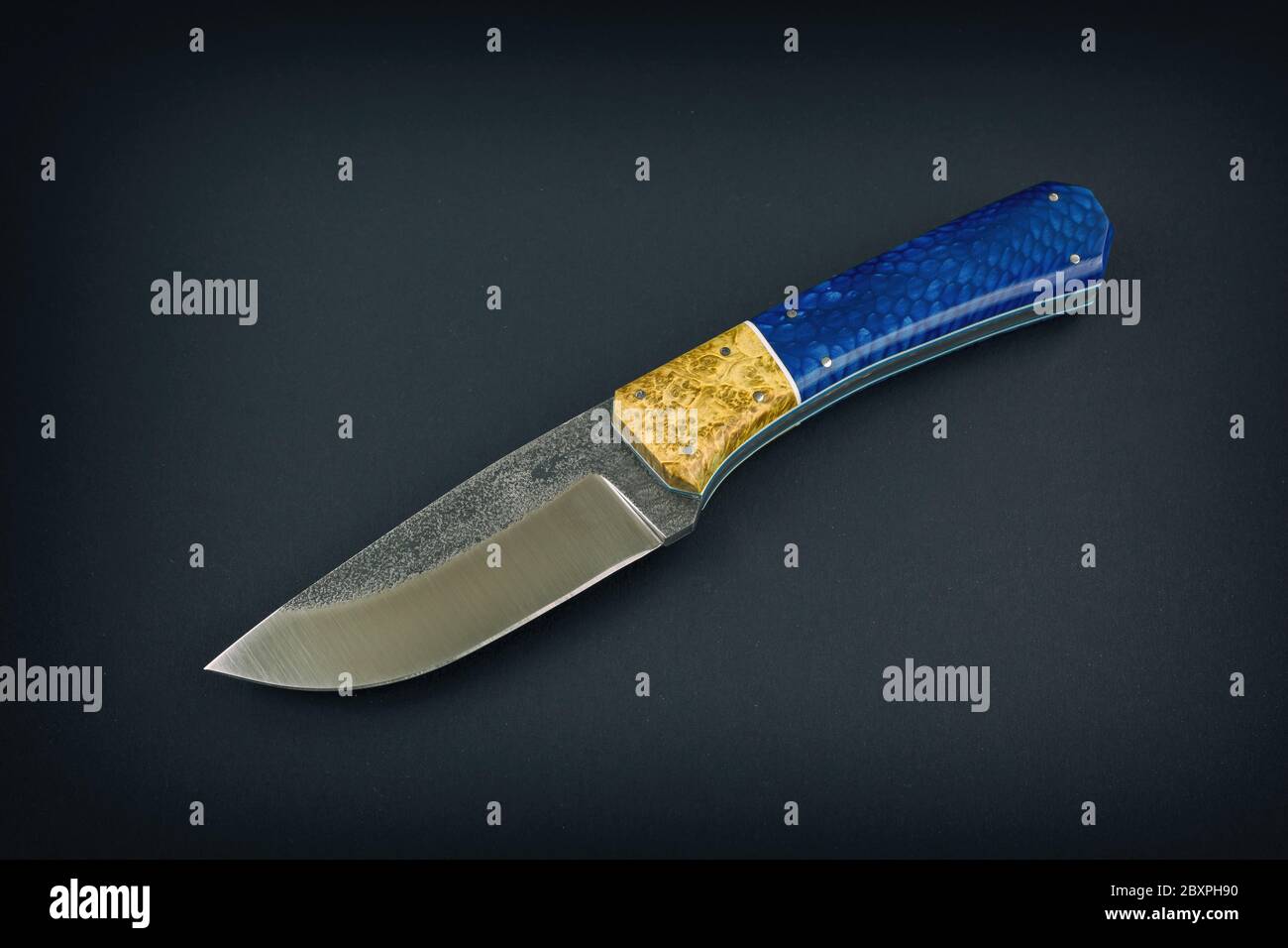 Fixed blade knife isolated on black background. Stock Photo
