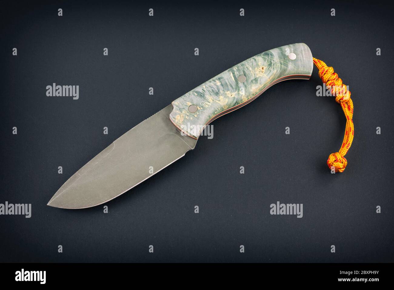 Fixed blade knife isolated on black background. Stock Photo
