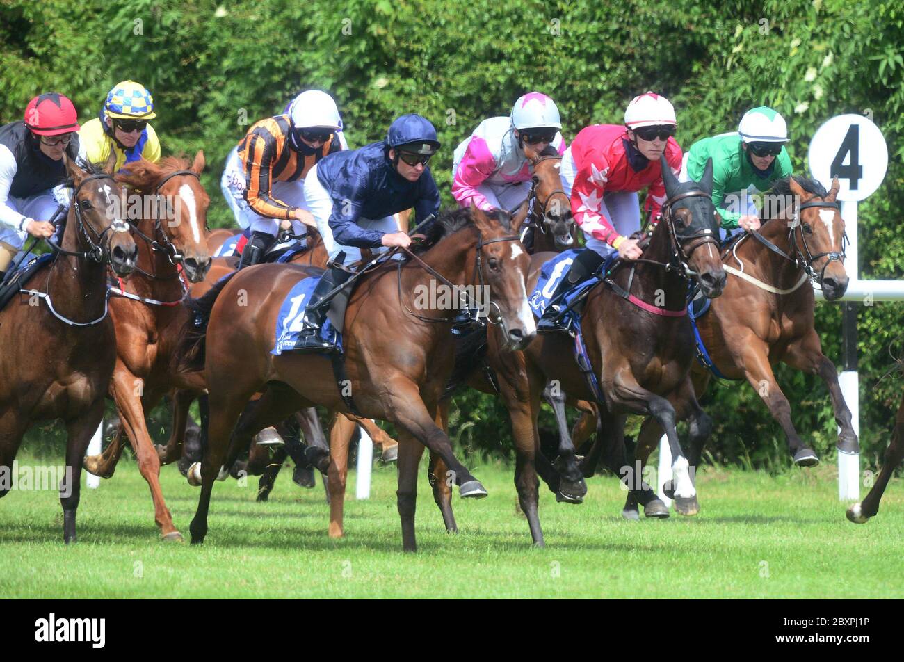 More Beautiful and jockey Seamus Heffernan (dark blue silks) Colours) on their way to winning the Irish Stallion Farms EBF Fillies Maiden at Naas Racecourse, Co. Kildare, Ireland. Stock Photo