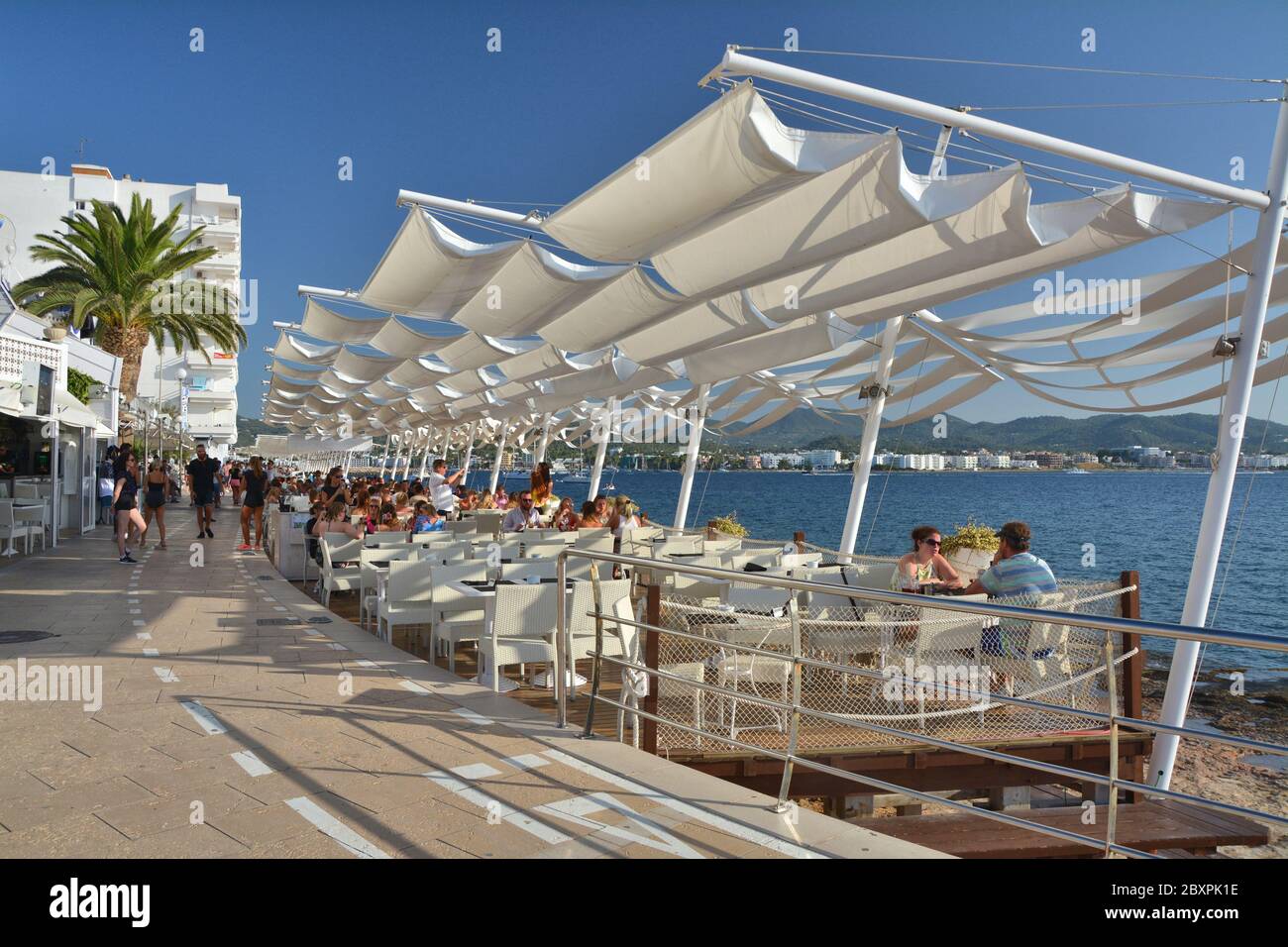 IBIZA, SPAIN - JULY 12, 2017: Cafe del Mar in San Antonio de Portmany on Ibiza island. It is a famous seaside bar with the best views of sunset with m Stock Photo