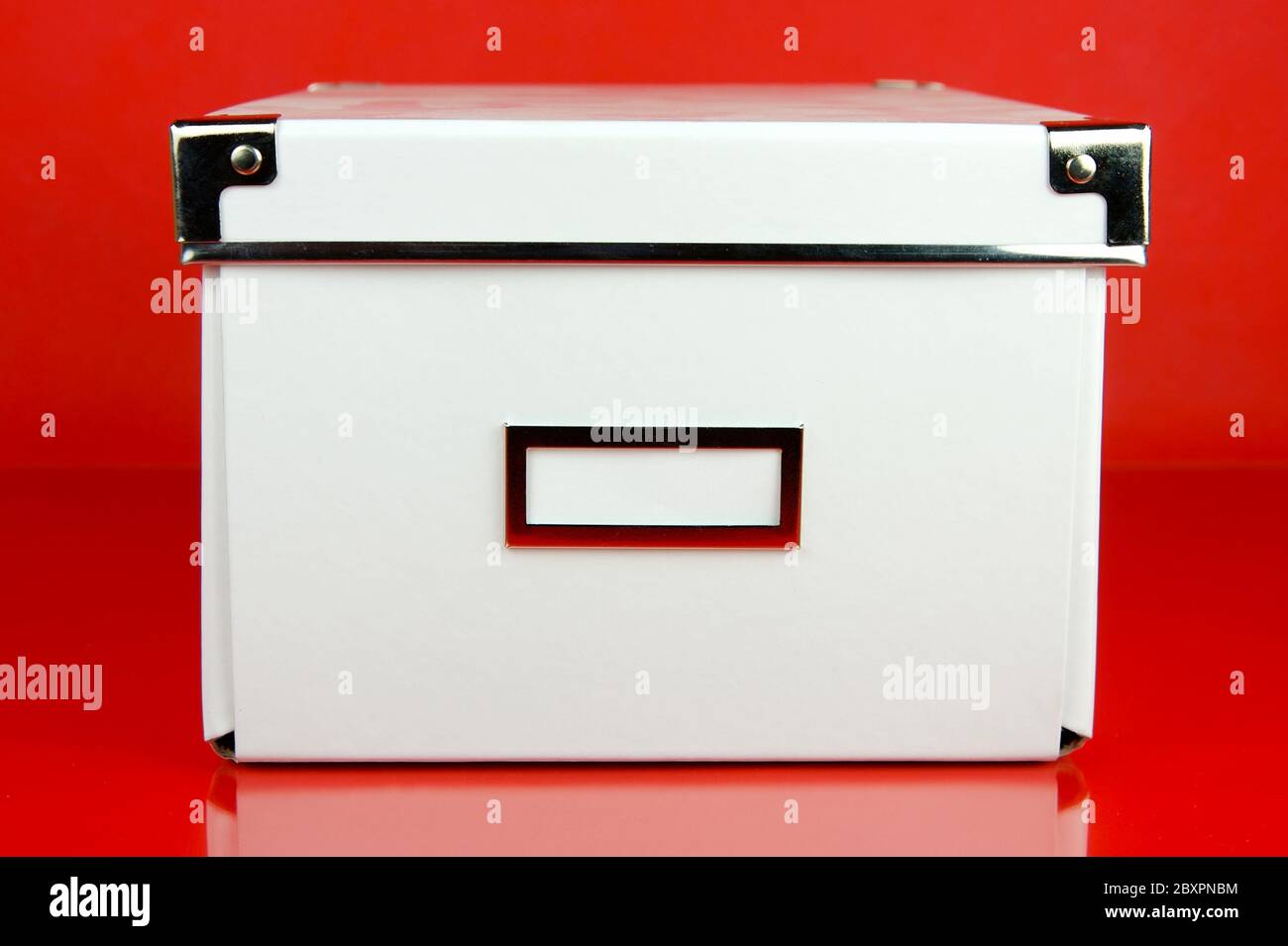 Isolate Storage Boxes Storage boxes isolated against a red background Stock Photo - Alamy