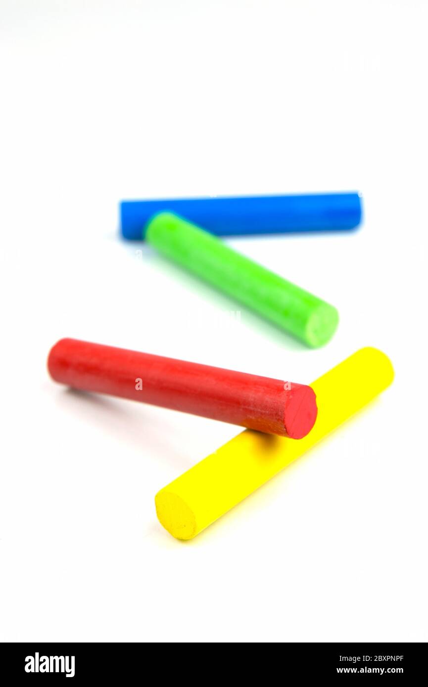 Colored crayons isolated against a white background Stock Photo - Alamy