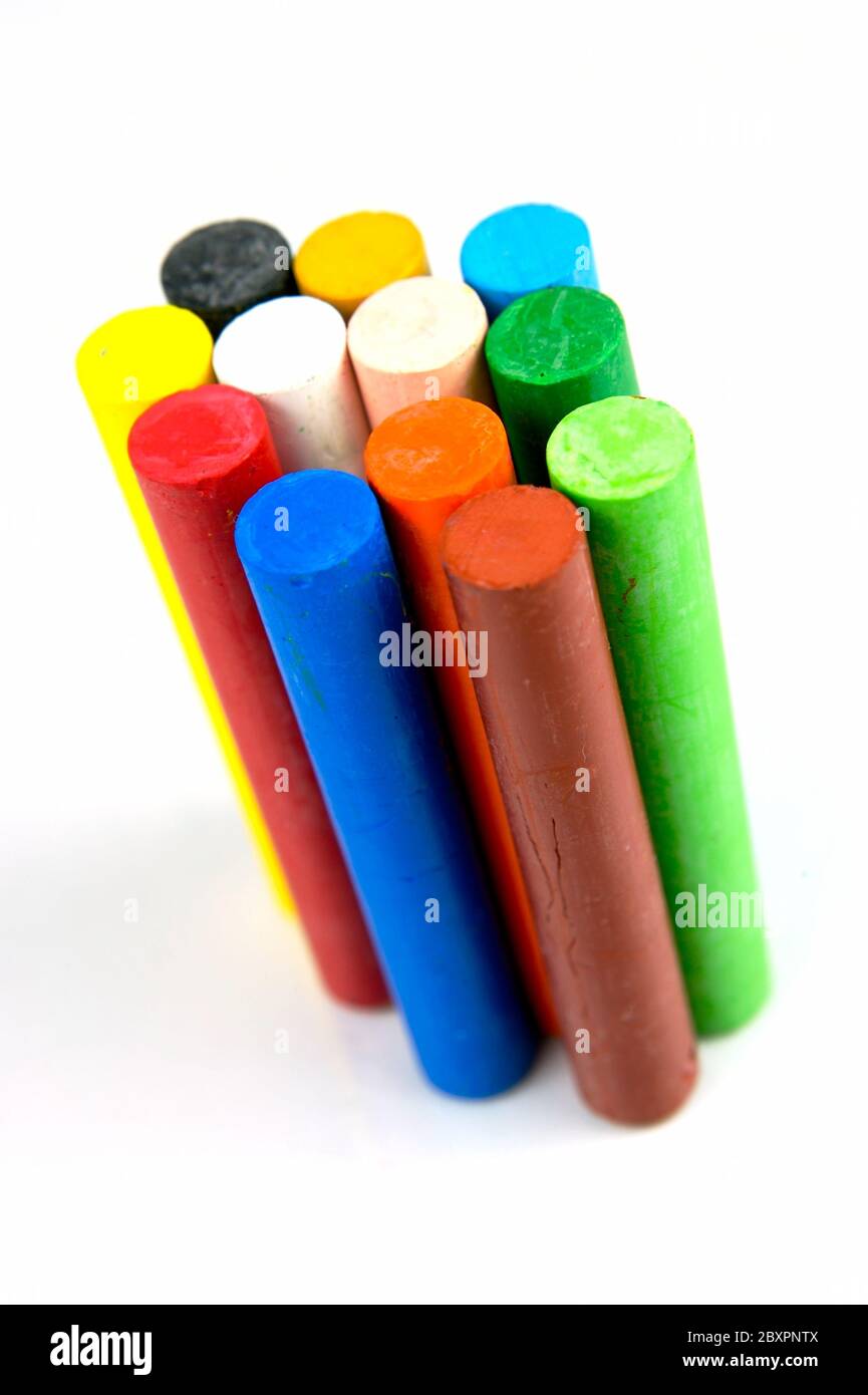 Colored crayons isolated against a white background Stock Photo - Alamy