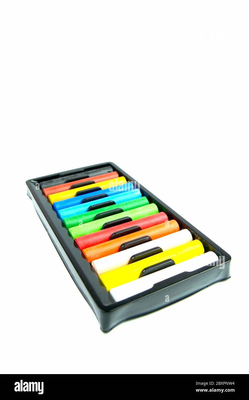 Colored crayons isolated against a white background Stock Photo - Alamy