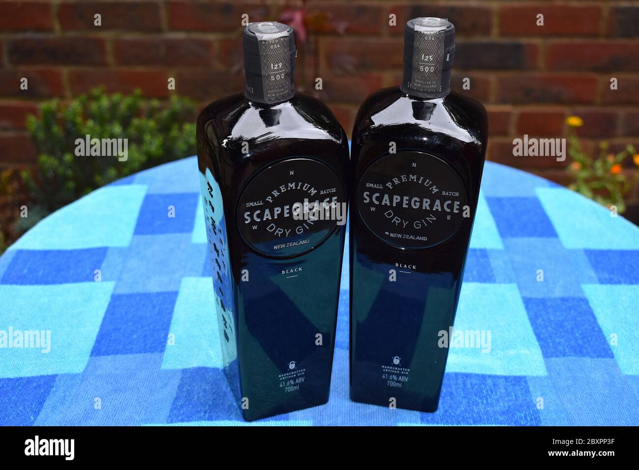 Scapegrace Black Premium New Zealand handcrafted artisan dry gin Naturally dark based on botanical extracts it changes to purple when mixed with tonic Stock Photo