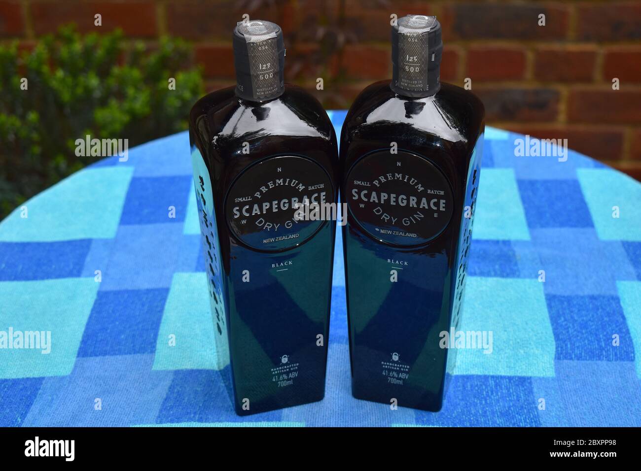 Scapegrace luxurious full bodied gin with candied sweet potato and pineapple finish It changes colour from black to purple when mixed with Tonic water Stock Photo
