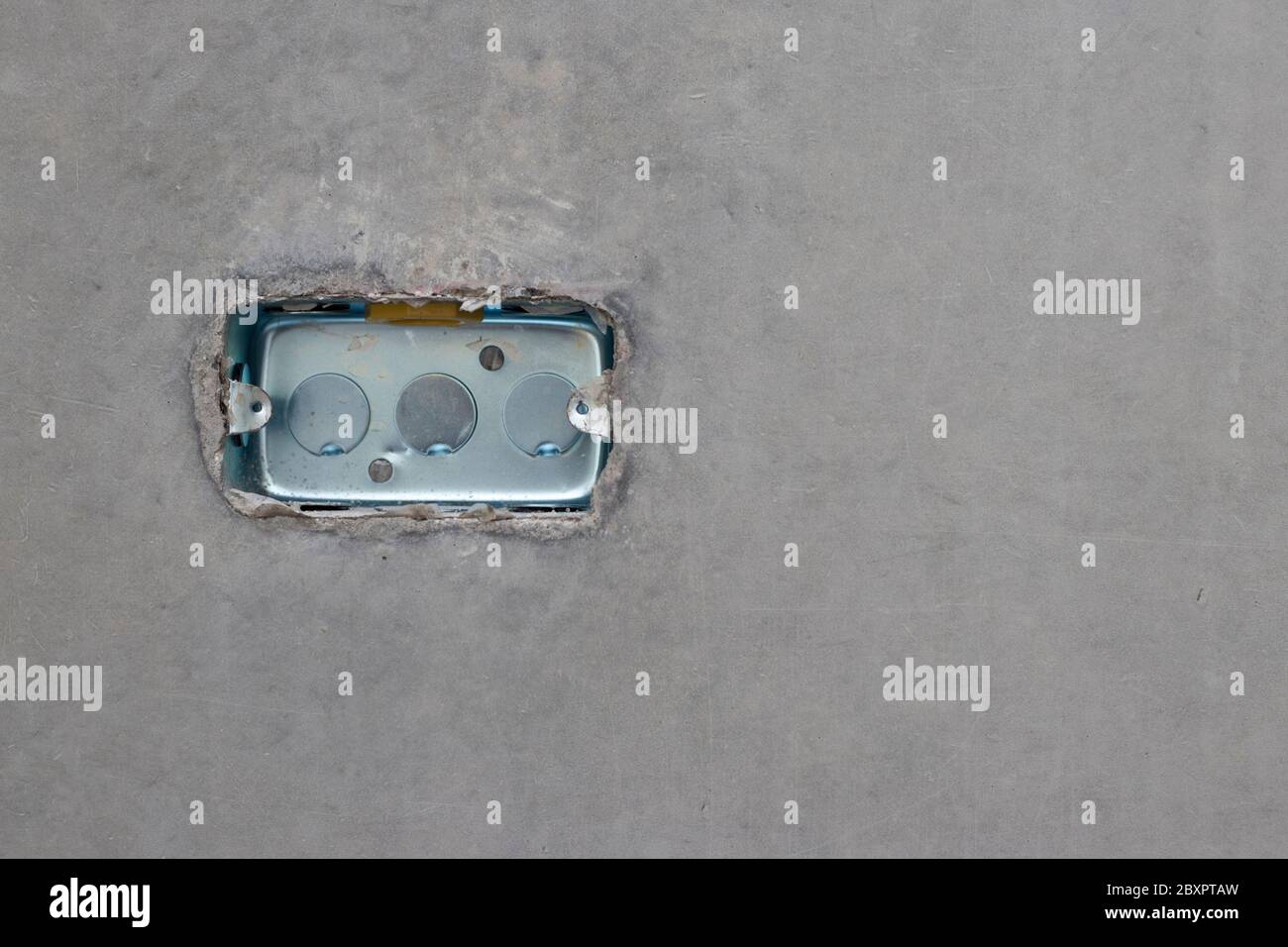 Handy Box embedded in the wall, prepared for electrical wiring Stock