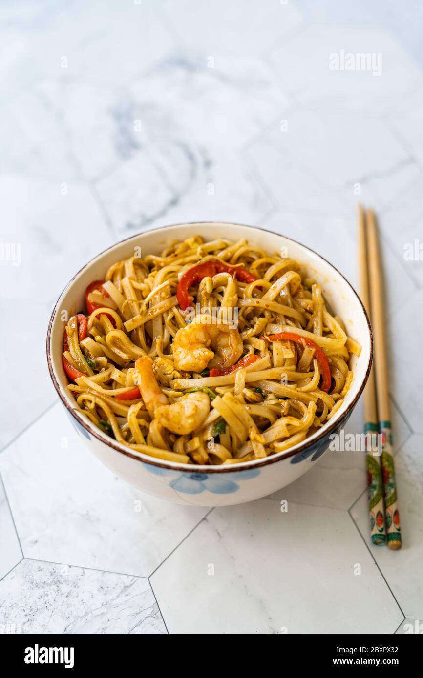 Pad Thai Noodles with Shrimp and Crushed Peanuts. Traditional Food