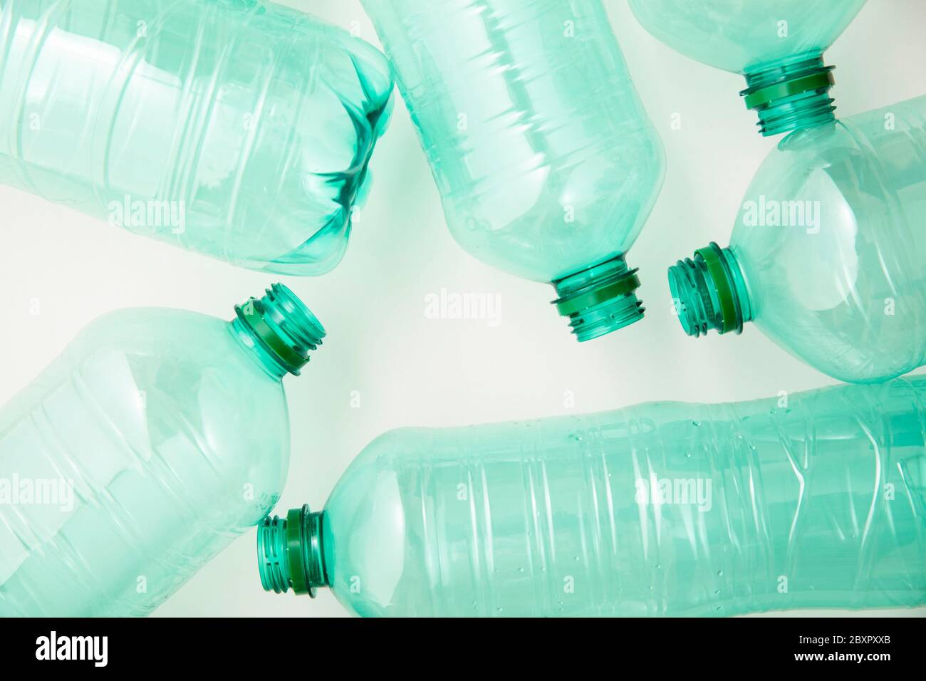 https://c8.alamy.com/comp/2BXPXXB/empty-used-green-plastic-water-bottles-for-recycling-environment-concept-2BXPXXB.jpg