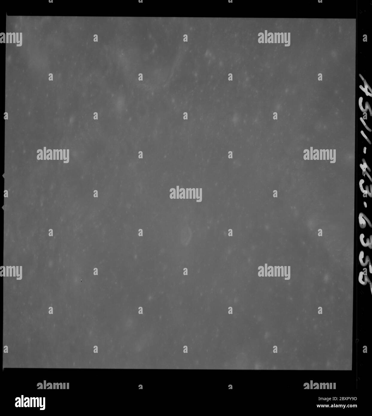 AS11-43-6355 - Apollo 11 - Apollo 11 Mission image - Moon just north of Crater 199; Scope and content:  The original database describes this as: Description: View of Moon,just north of Crater 199, officially named Saenger .  Image take from the Command Module at approximately 60 nautical miles orbital altitude during the Apollo 11 Mission.  Original film magazine was labeled T. Film Type: 3400 Black/White Panatomic-X film on a 2.5 mil Estar polyester base taken with a 250mm lens. Approximate Photo Scale: 1:731,000. Principal Point Latitude 6 degrees North,Longitude 103 degrees East. Foward ove Stock Photo