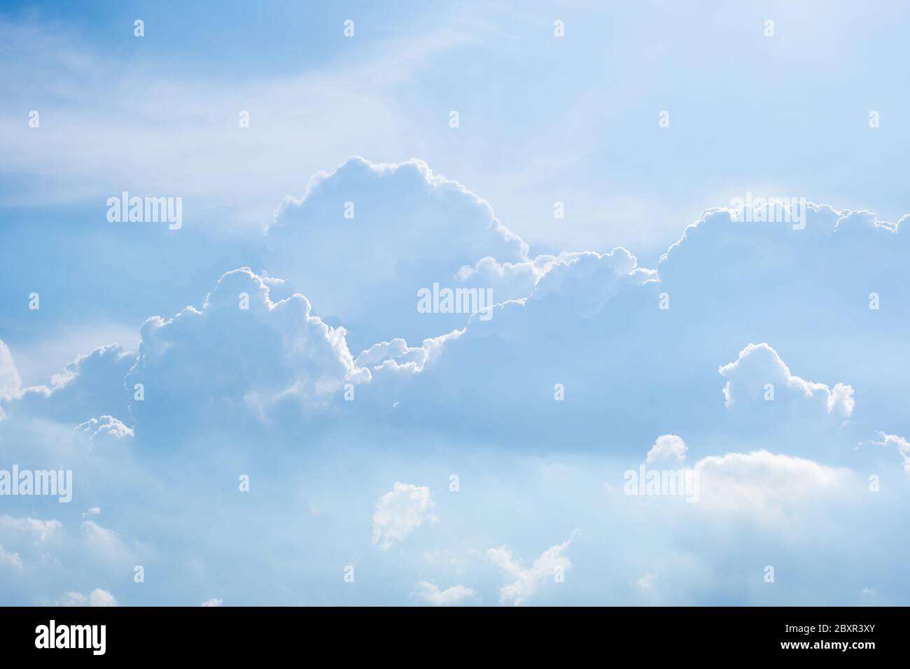 The beauty of the sky with clouds and the sun. Stock Photo