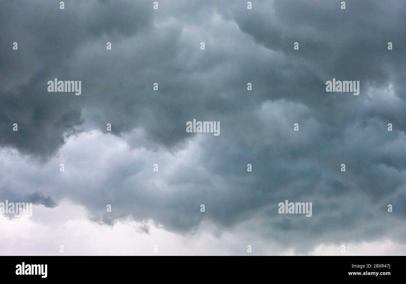 Black rain clouds in the sky. Stock Photo