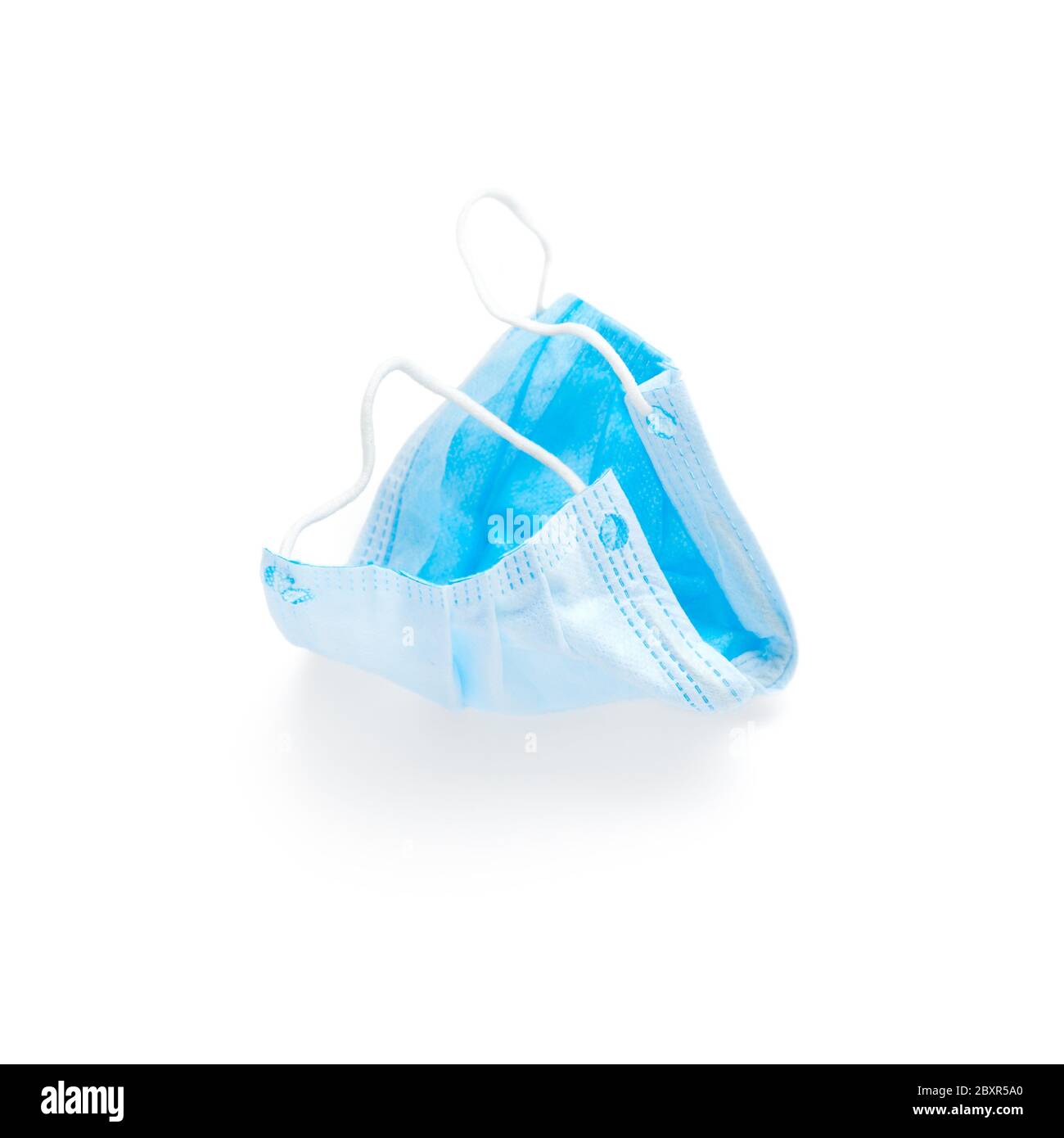 Blue medical mask top view isolated on white background Stock Photo - Alamy